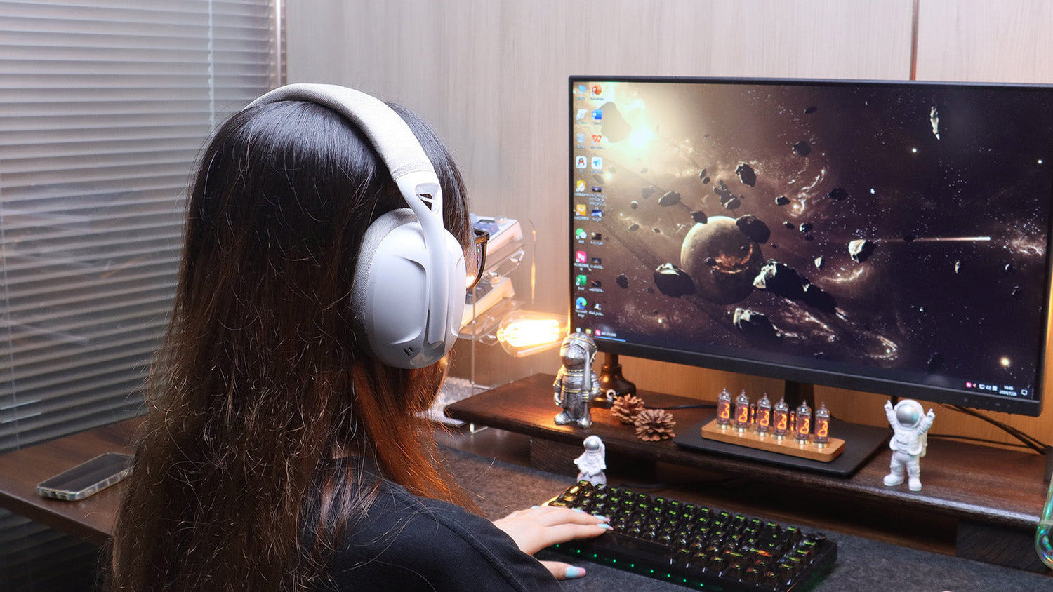 A person wearing white lightweight gaming headphones while using a computer, demonstrating their practical use during gameplay