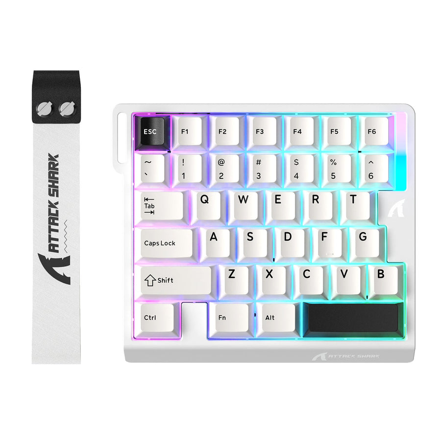 A one-handed gaming keyboard works alongside a regular keyboard for PC gaming and everyday computer control.