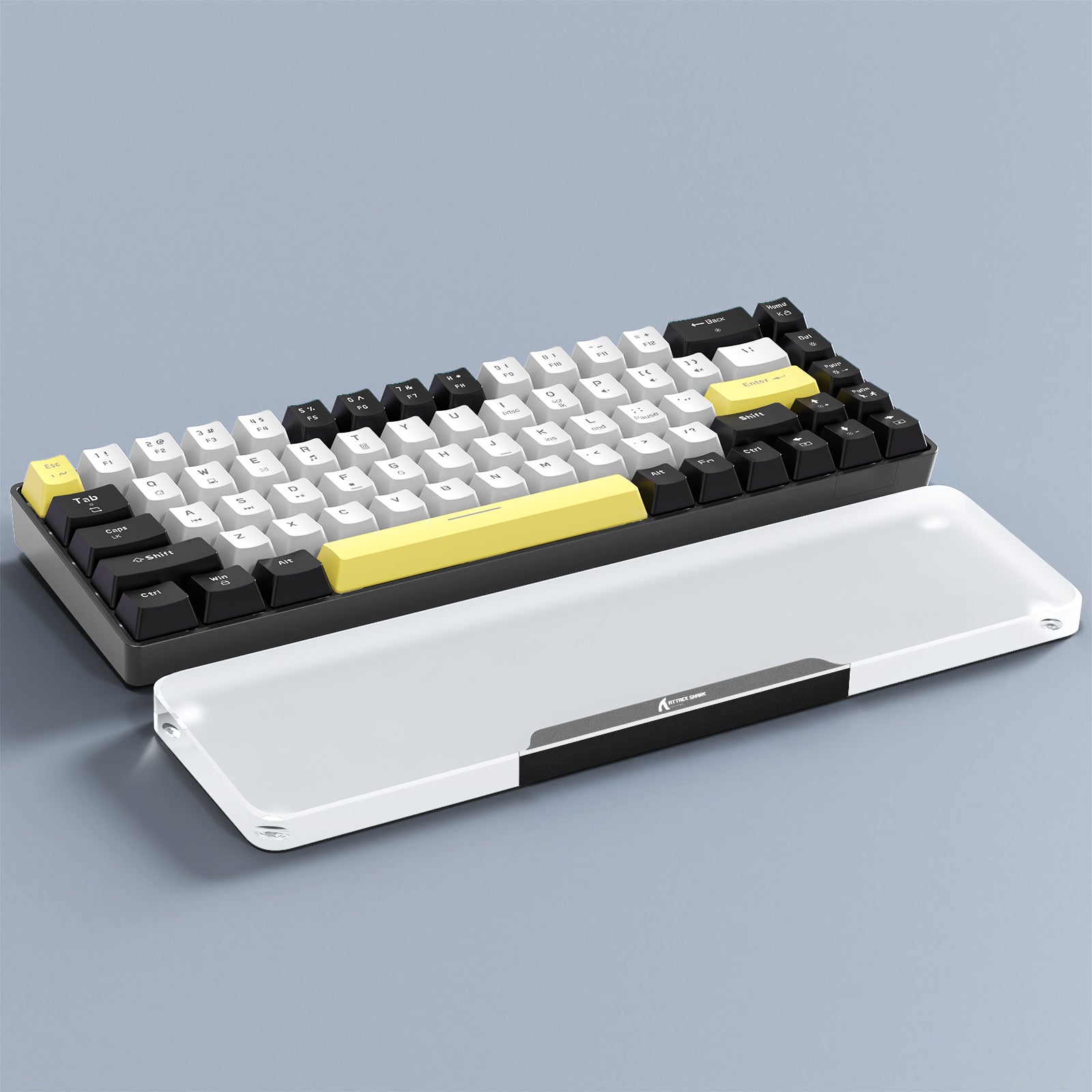 Gaming mechanical keyboard with gray and yellow keycaps and clear wrist rest.