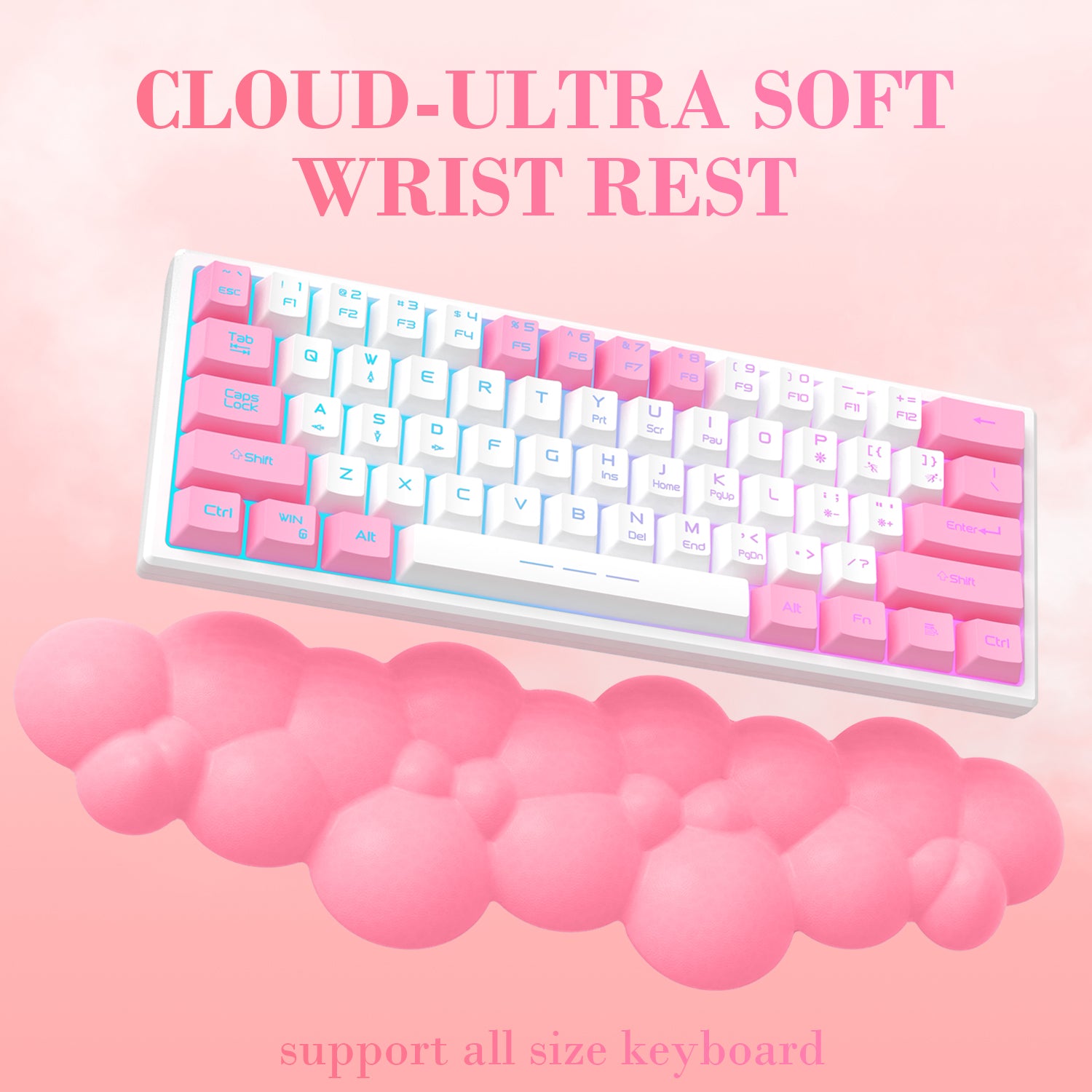 Pink cloud-shaped wrist rest beside pastel RGB mechanical keyboard.