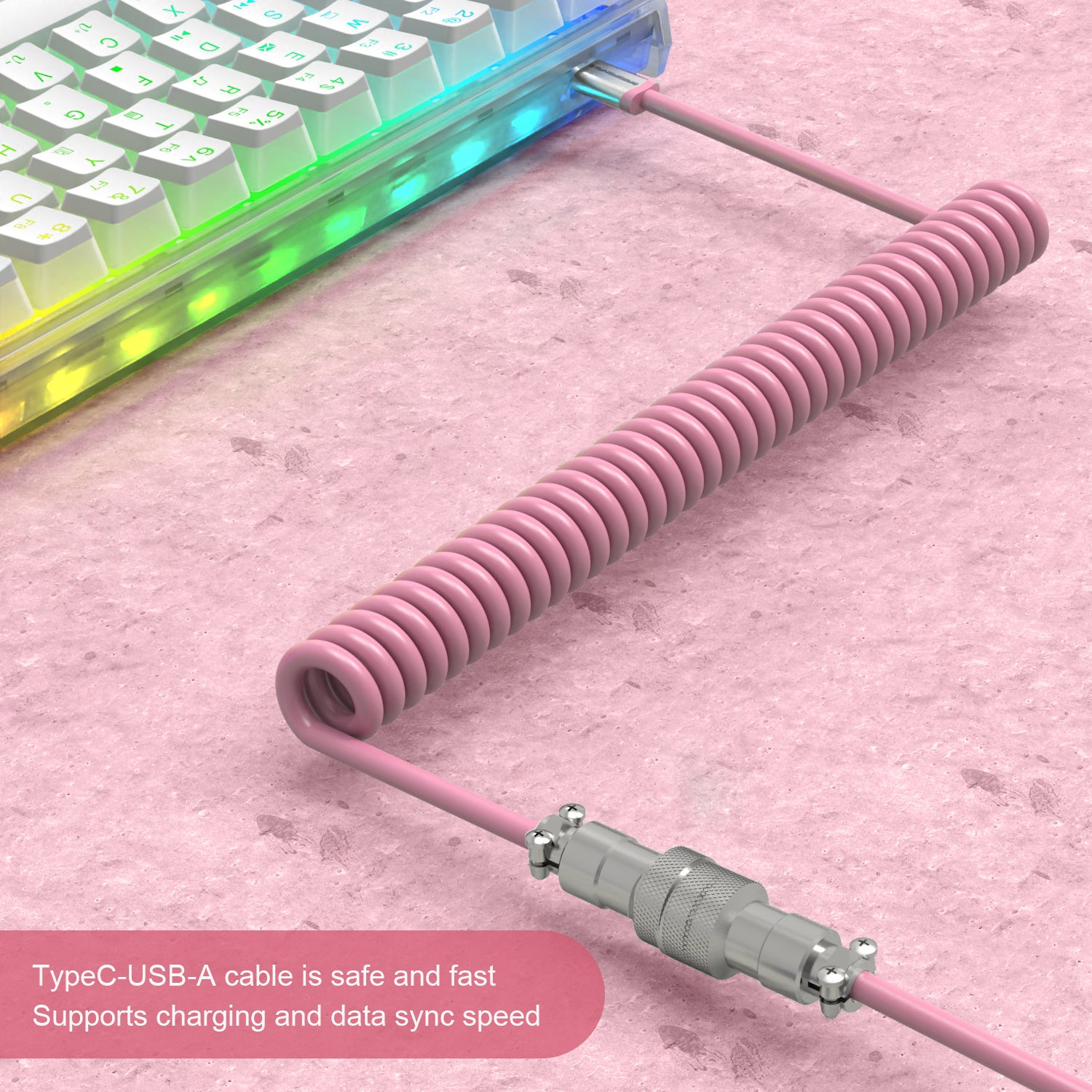 Pink coiled USB-C keyboard cable with metal aviator connector and USB-A end.