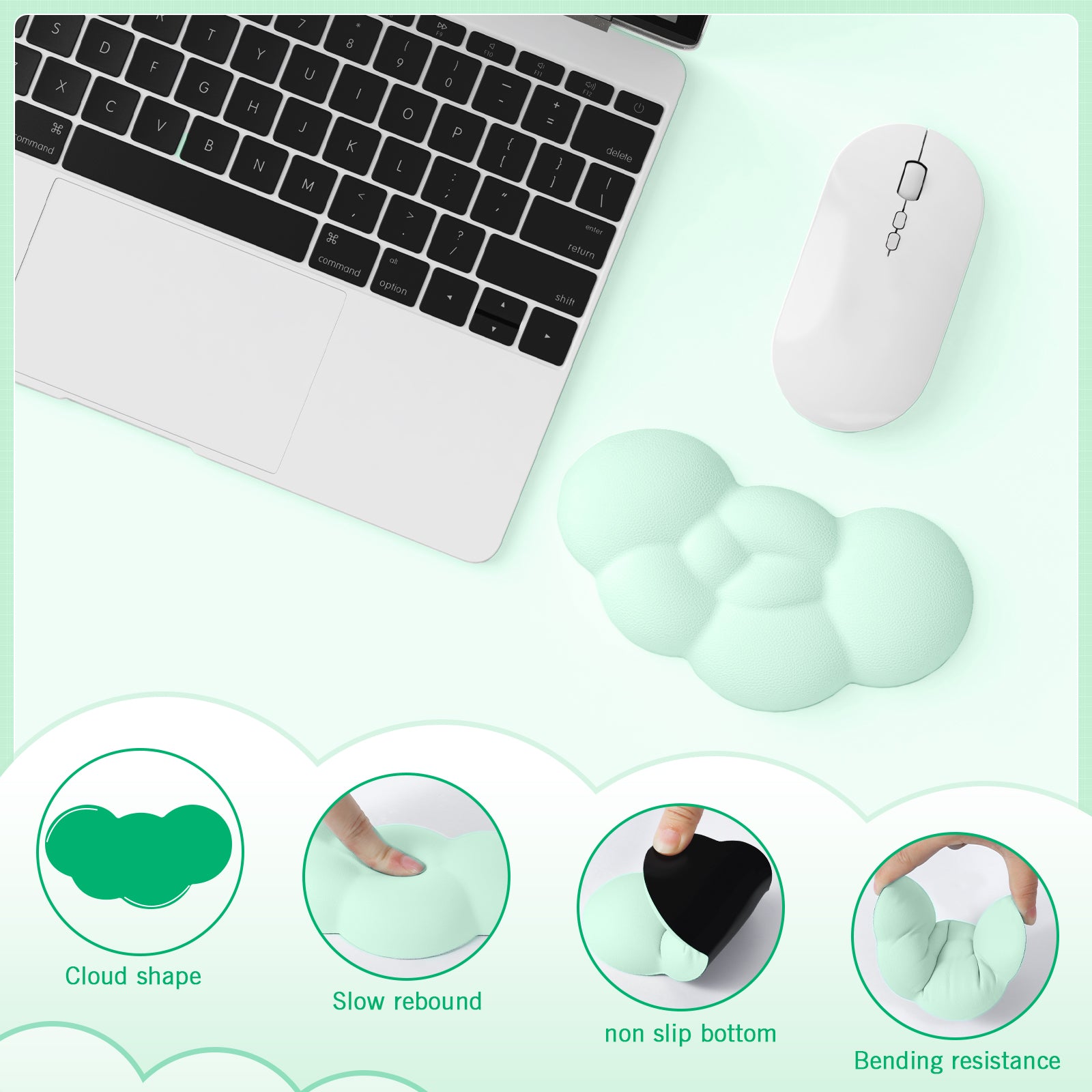 Mint green cloud-shaped wrist rest next to white gaming mouse and laptop.