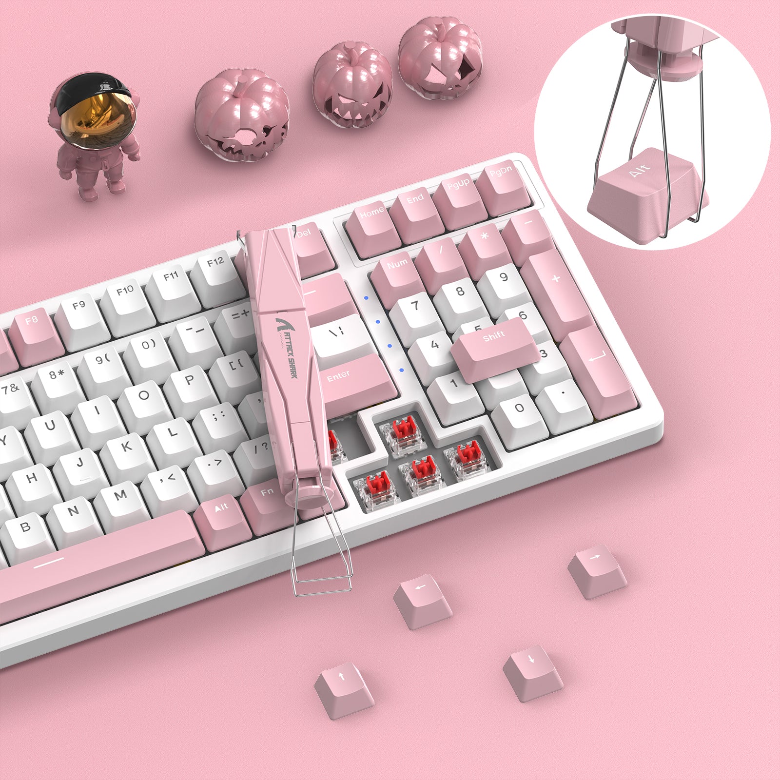 Pink Attack Shark 2-in-1 keycap and switch puller on white gaming keyboard with pink keycaps.