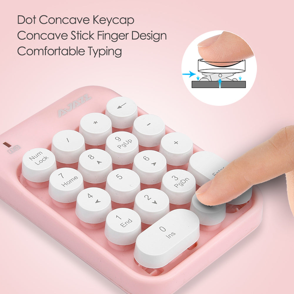 Pink wireless numeric keypad showcasing concave round keycaps and typing comfort.