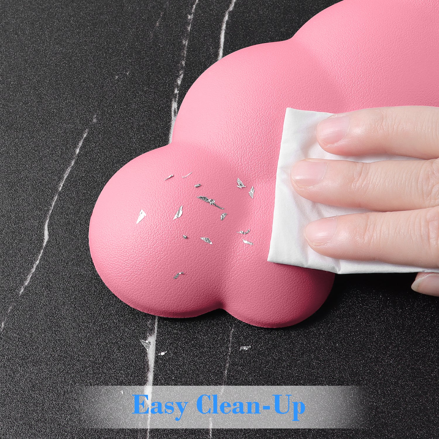 Hand cleaning pink cloud-shaped wrist rest with easy wipe surface.