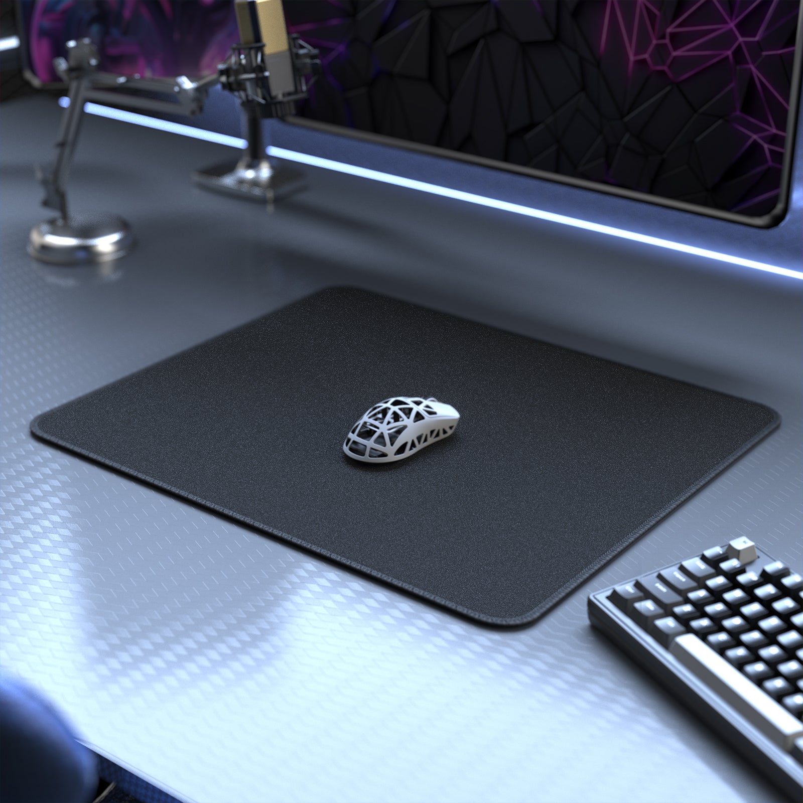 Black Attack Shark gaming mouse pad with anti-slip base and gaming mouse on top.