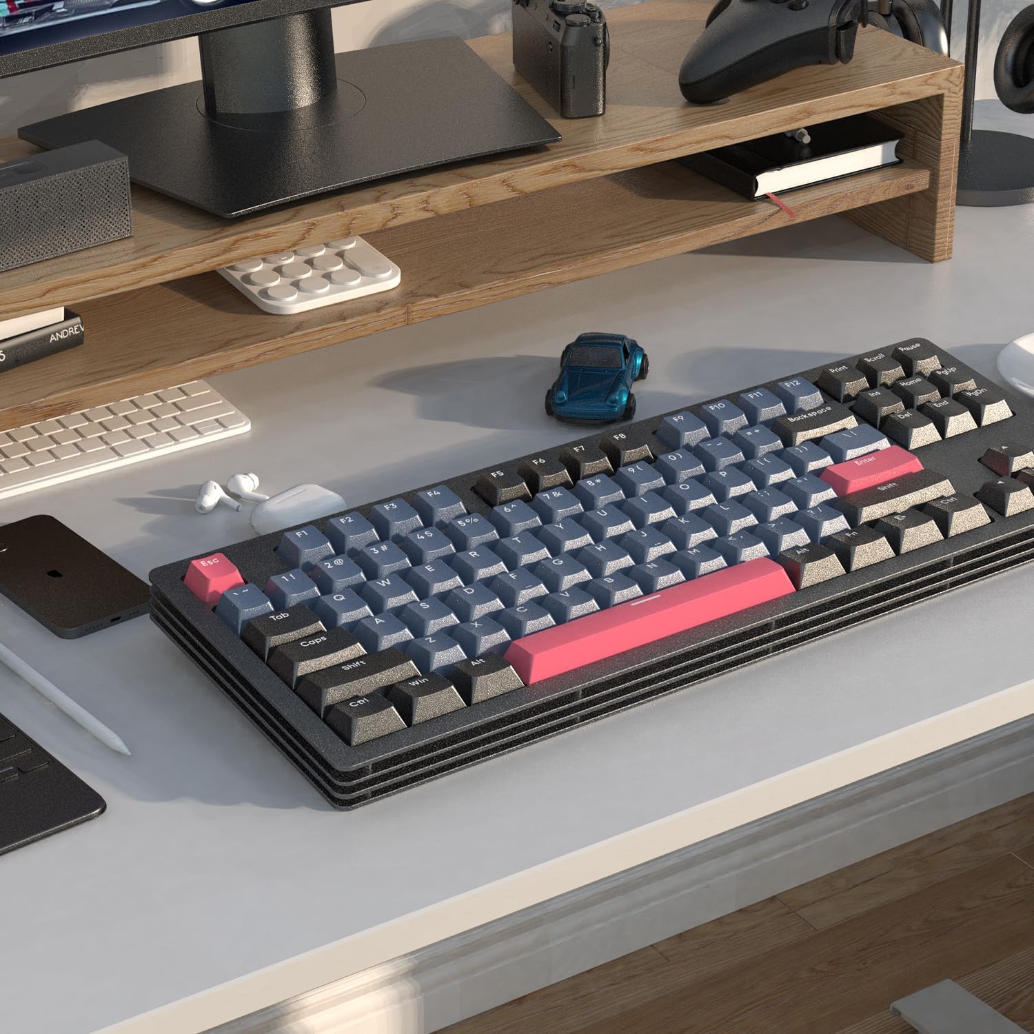 AJAZZ AKC087 mechanical keyboard with blue-gray and pink keycaps on a modern desk.