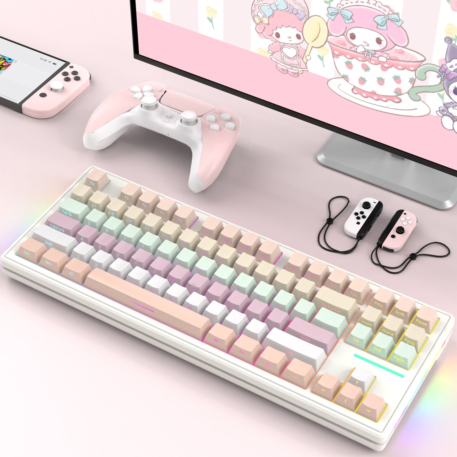 Pastel gradient keyboard with side-printed keycaps and gaming accessories on a light surface.