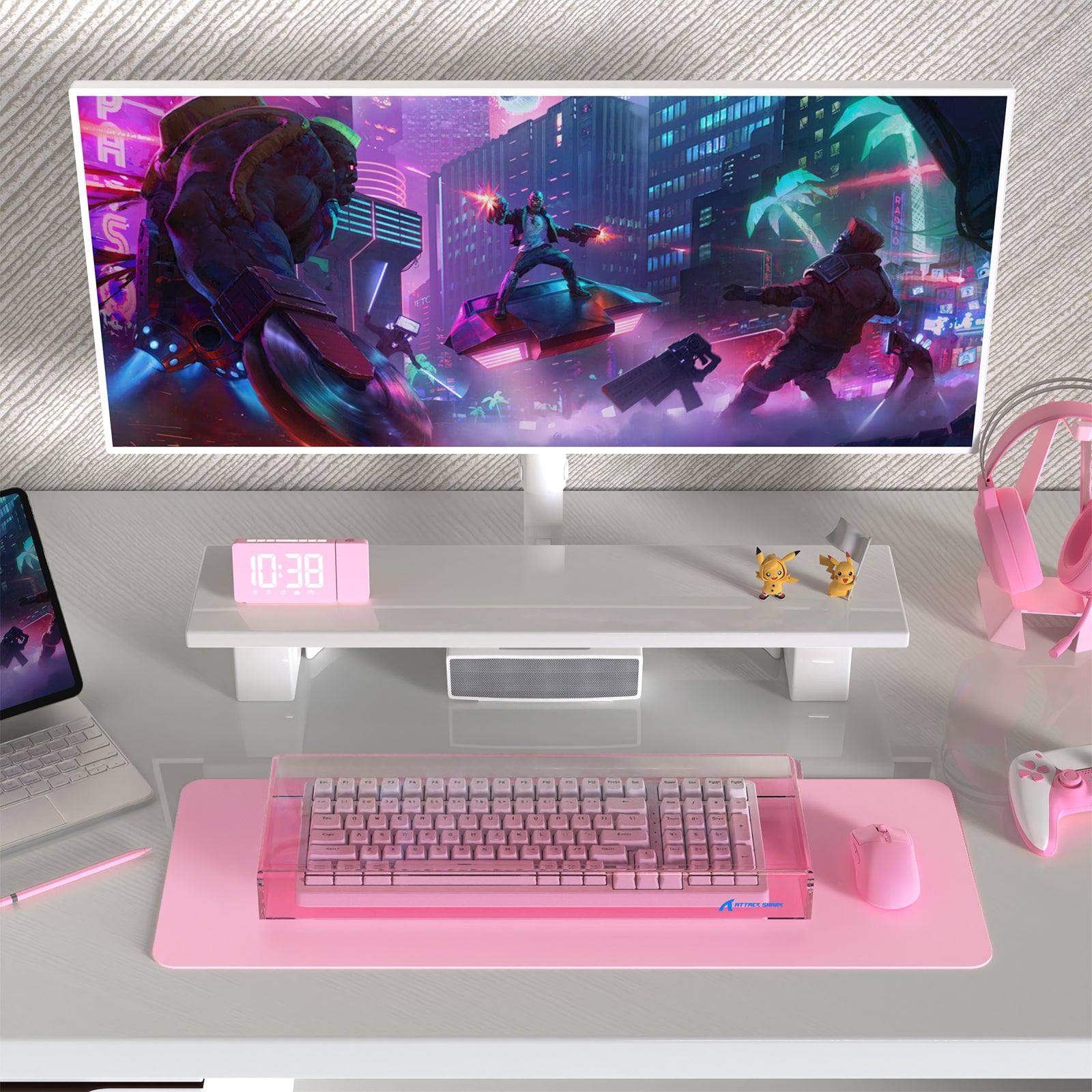 Pink acrylic keyboard cover on 98 keys keyboard in vibrant gaming setup with monitor.