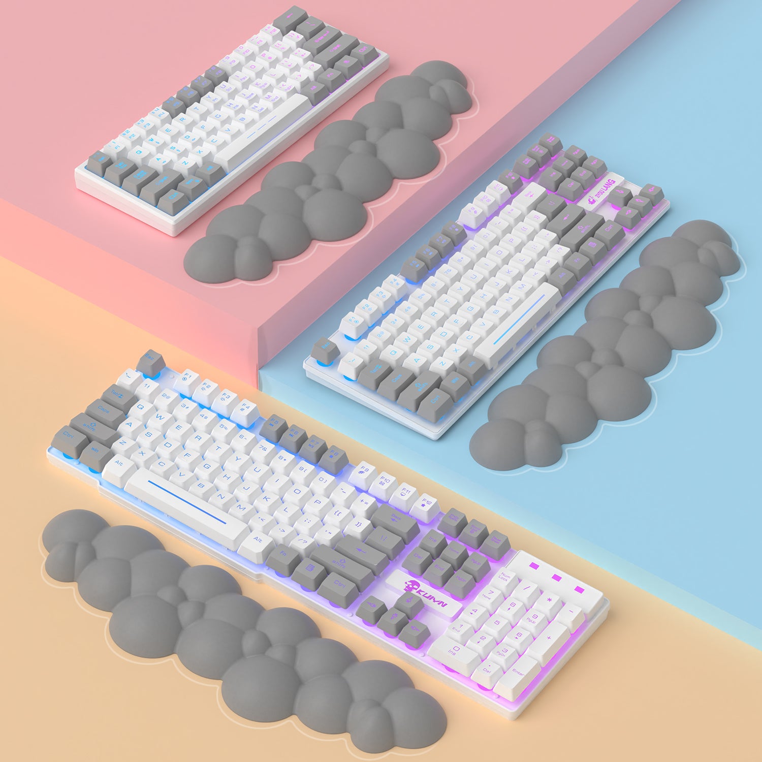 Gray cloud-shaped wrist rest supporting colorful mechanical keyboards.