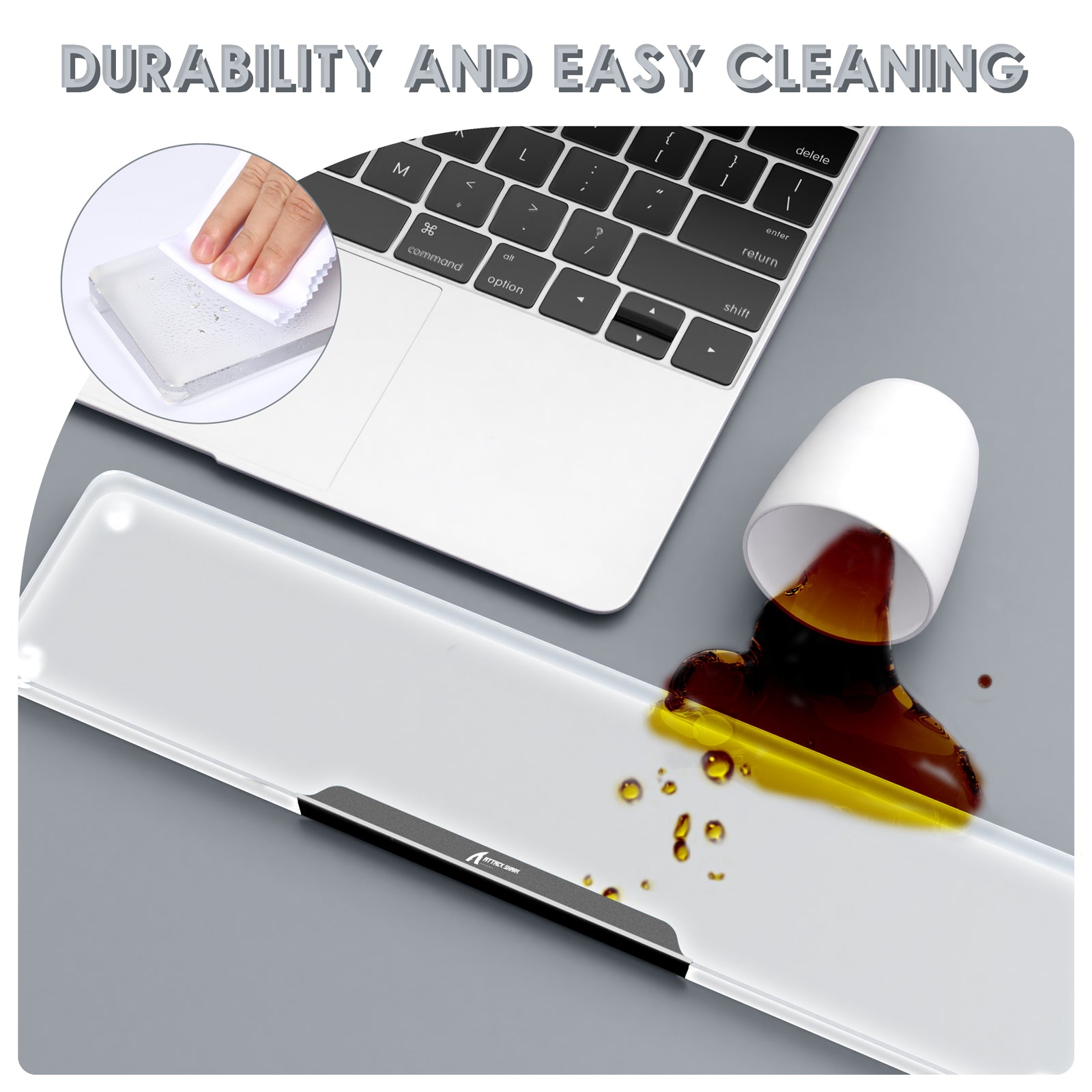 Acrylic wrist rest beside laptop, showcasing spill resistance and easy cleaning feature.