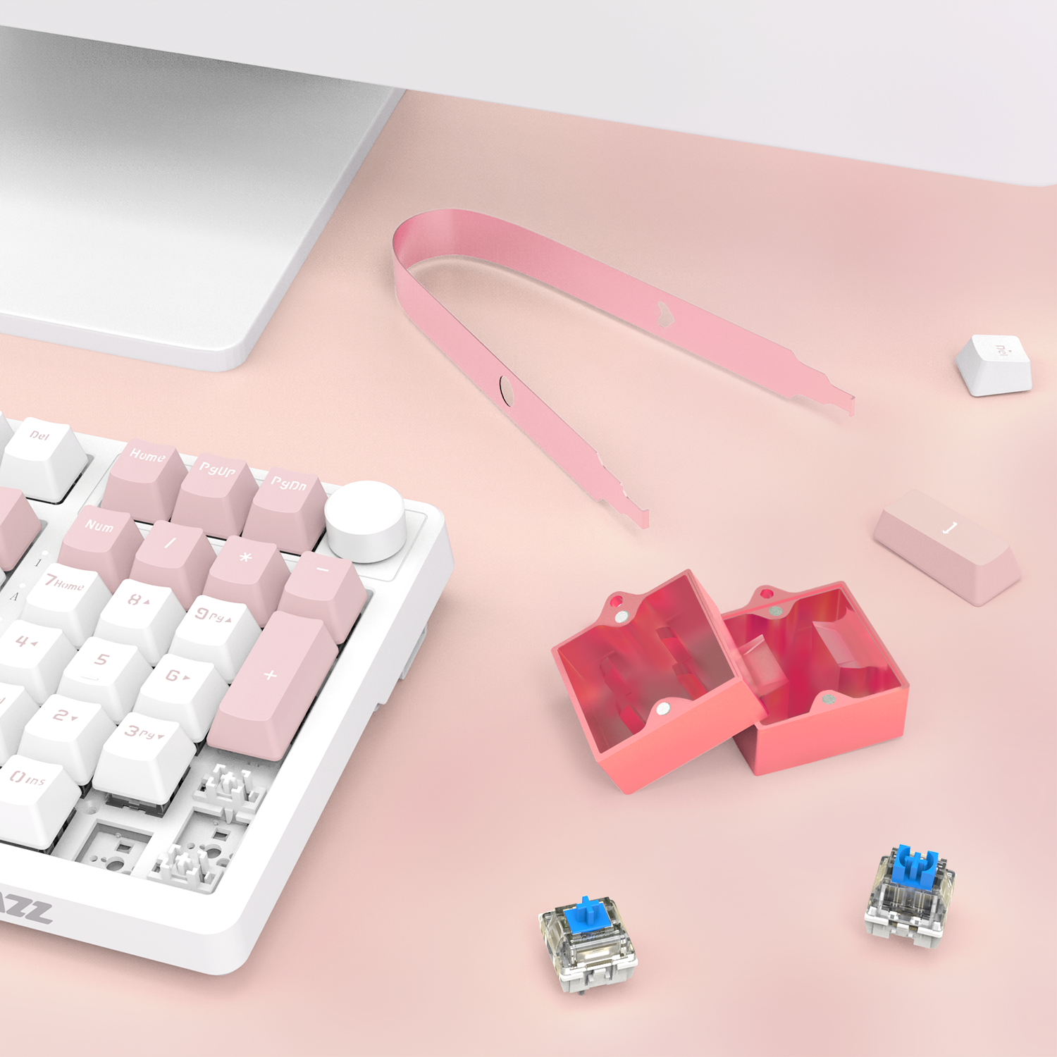 Pink switch opener kit with holder and mechanical switches for keyboard customization.