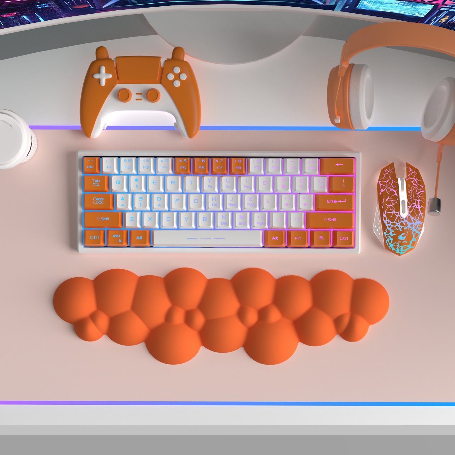 Orange cloud-shaped wrist rest with gaming accessories and mechanical keyboard.