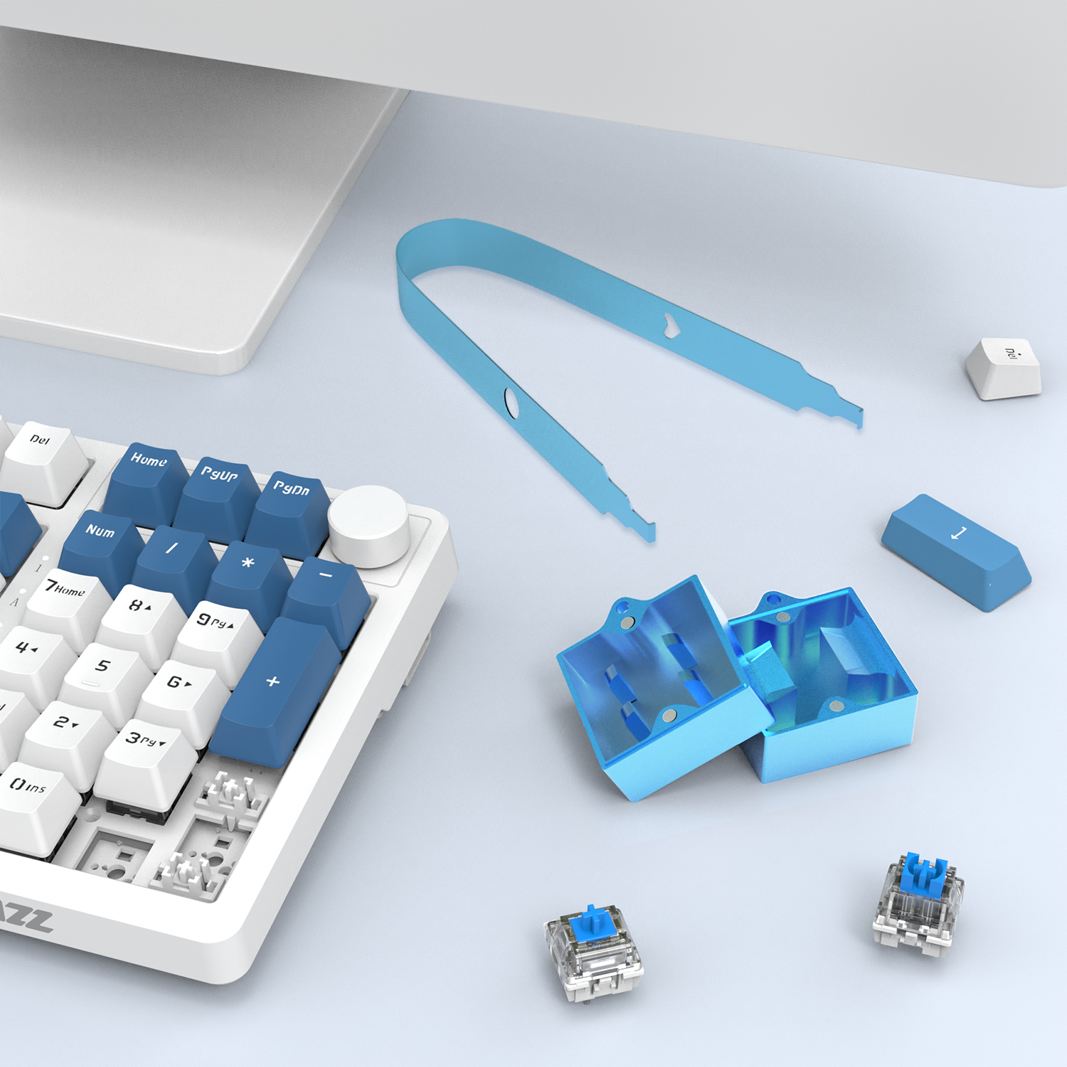 Blue switch opener kit with puller for Cherry MX mechanical keyboards.