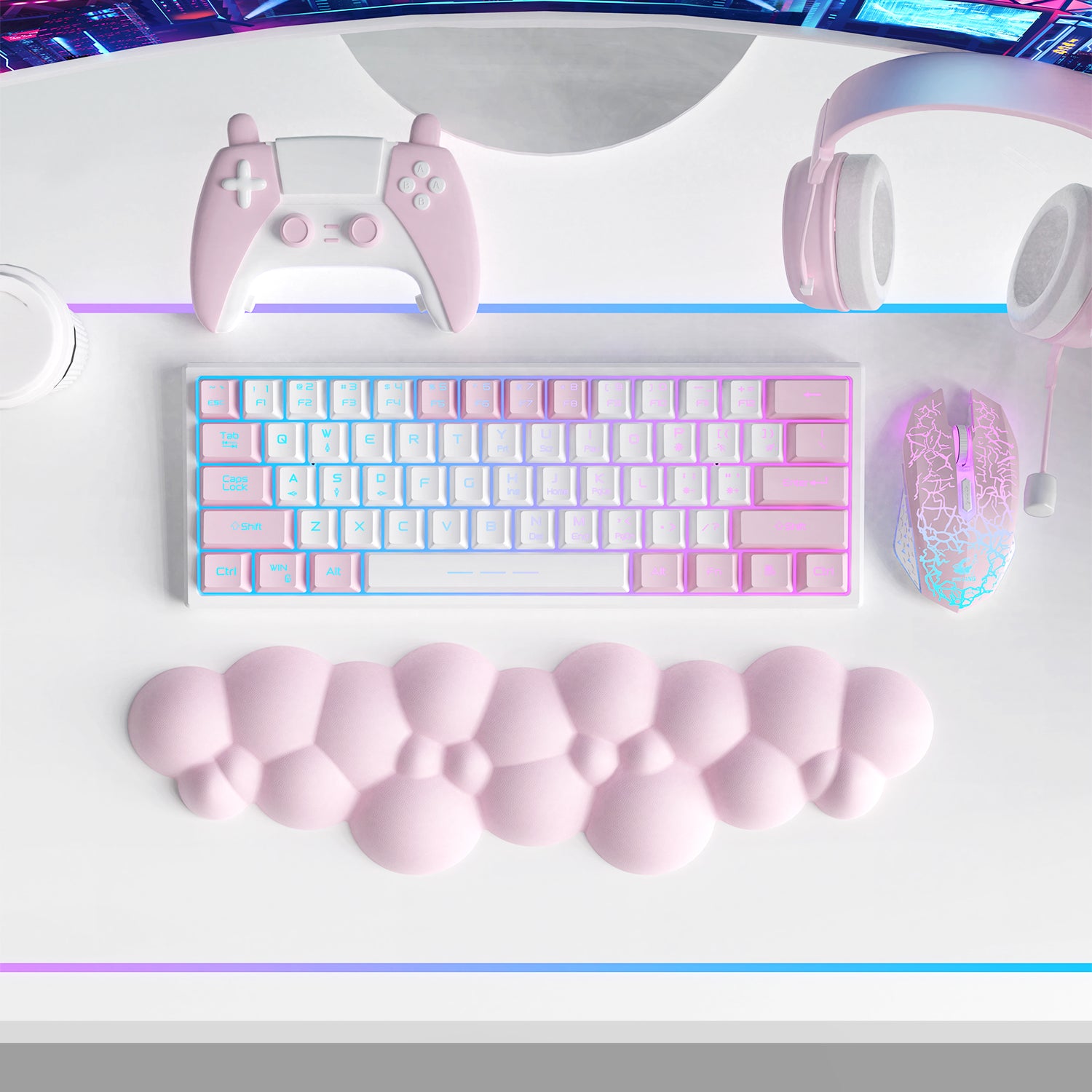 Pink cloud-shaped ergonomic wrist rest with a white mechanical keyboard and gaming accessories.