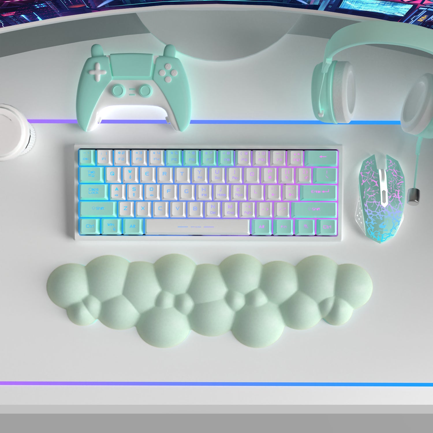 Mint green cloud-shaped wrist rest beside pastel keyboard, gaming mouse, and accessories.