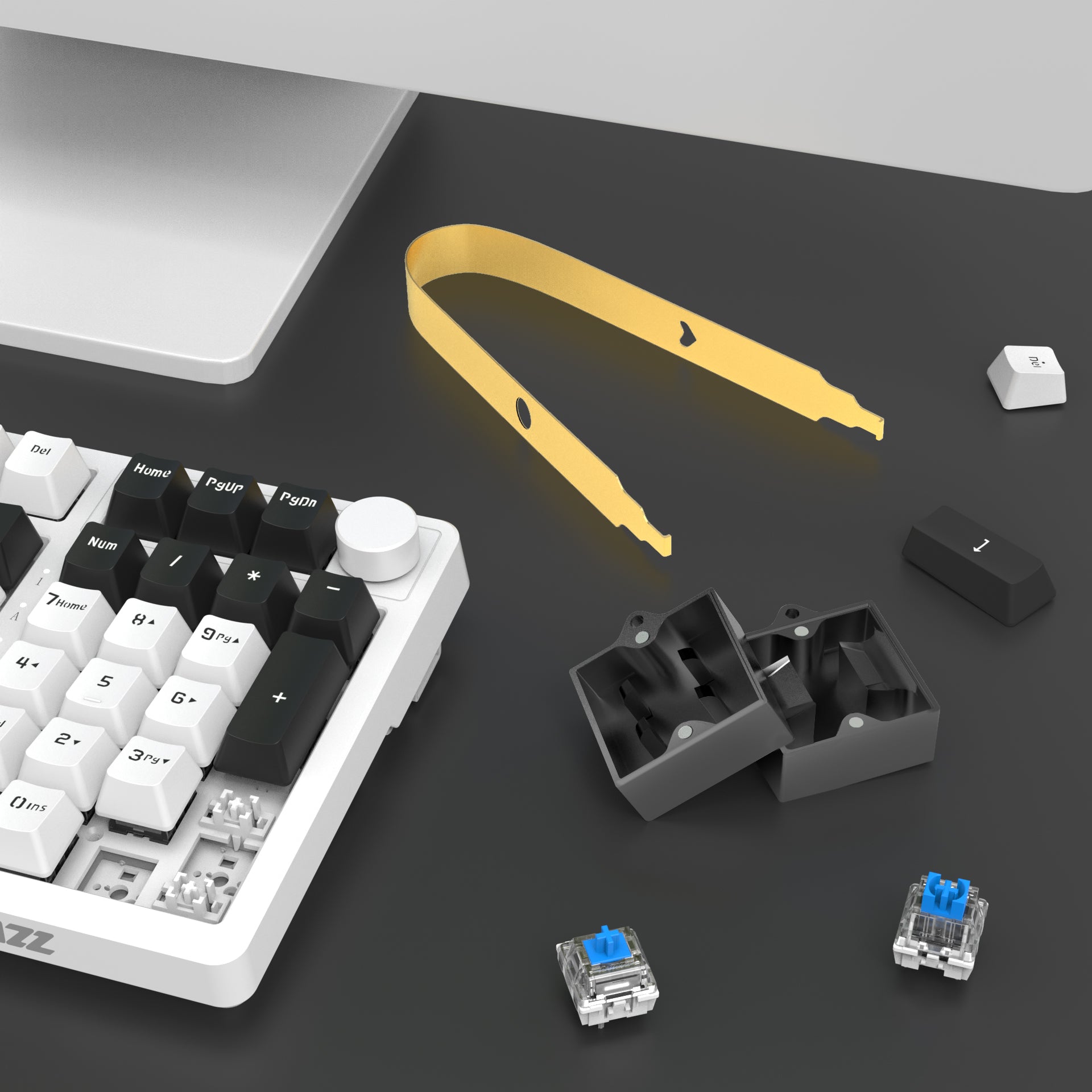 Yellow switch opener kit with holder and Cherry MX switches next to a mechanical keyboard.