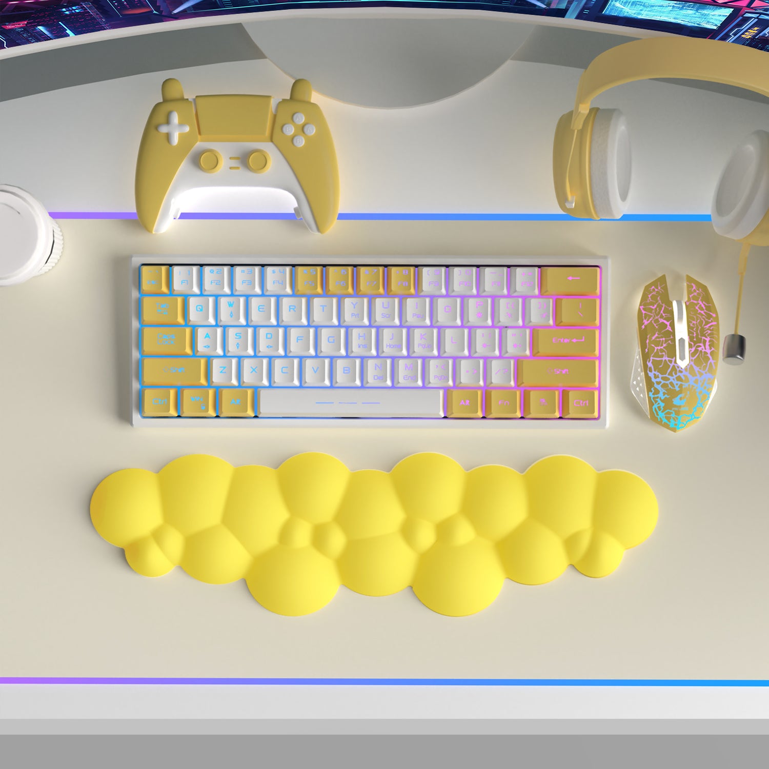 Yellow cloud-shaped wrist rest with ergonomic design next to pastel keyboard and gaming accessories.