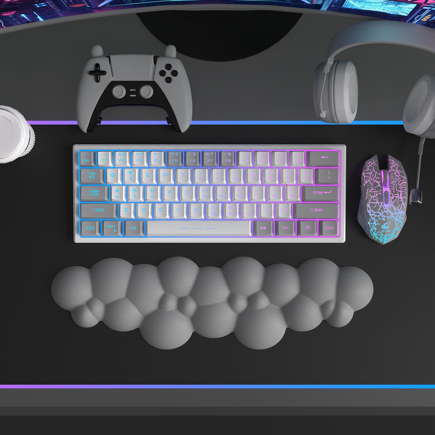 Gray cloud-shaped ergonomic wrist rest under a light blue-purple mechanical keyboard.