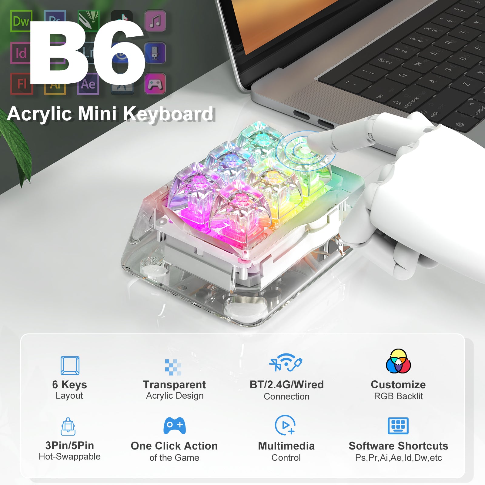 B6 acrylic mini keyboard with RGB lighting and customizable keys, connected to a laptop.