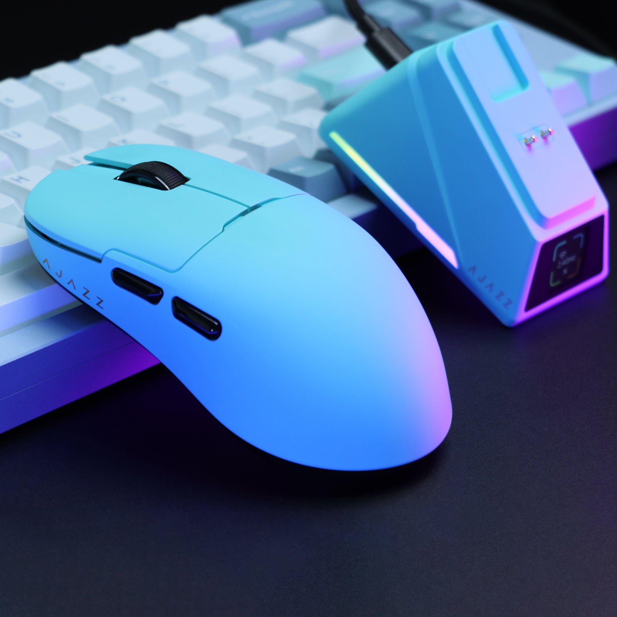 Gradient blue AJAZZ AJ159 APEX mouse beside RGB-lit 8K charging dock on white keyboard.