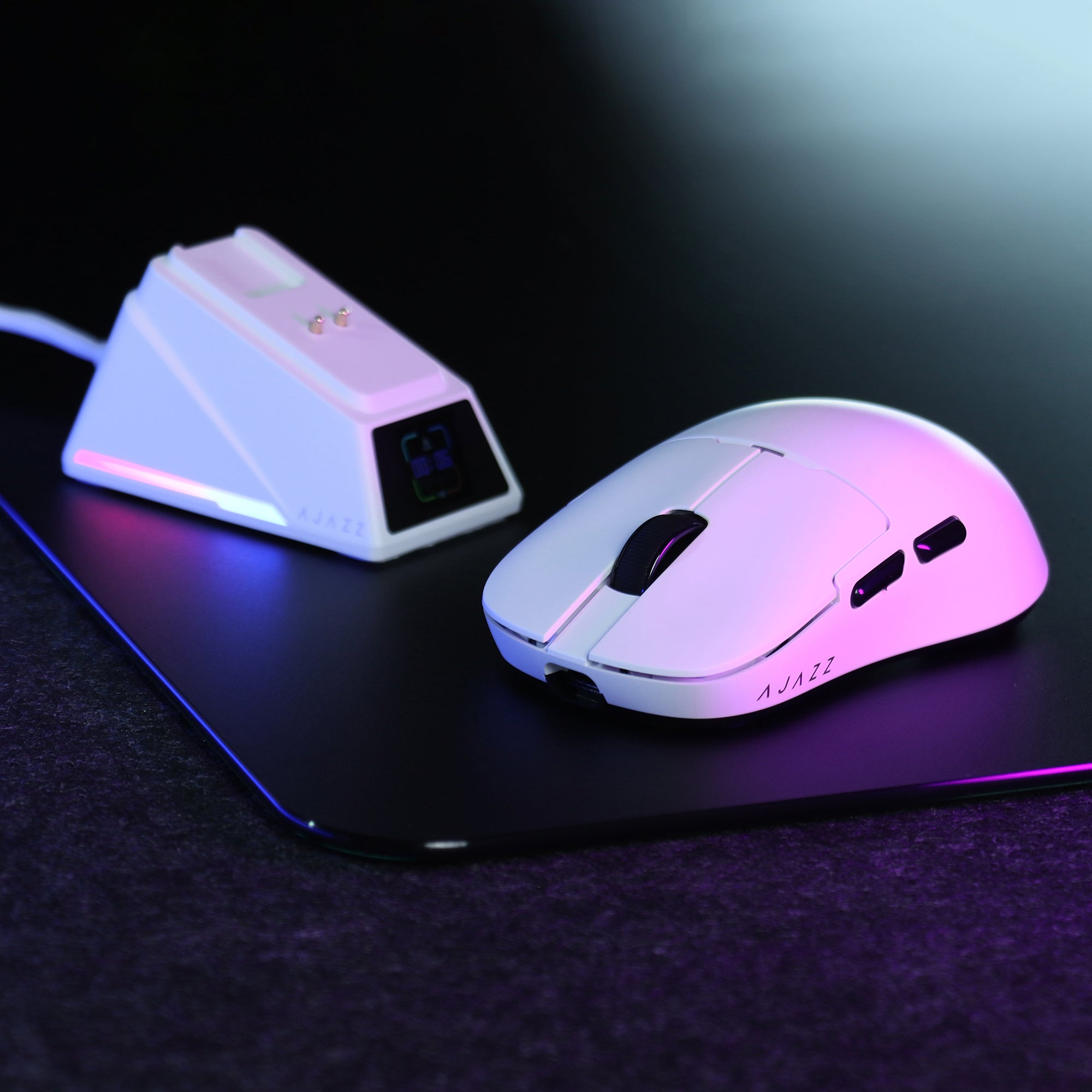 AJAZZ AJ159 APEX white gaming mouse next to illuminated 8K charging dock.